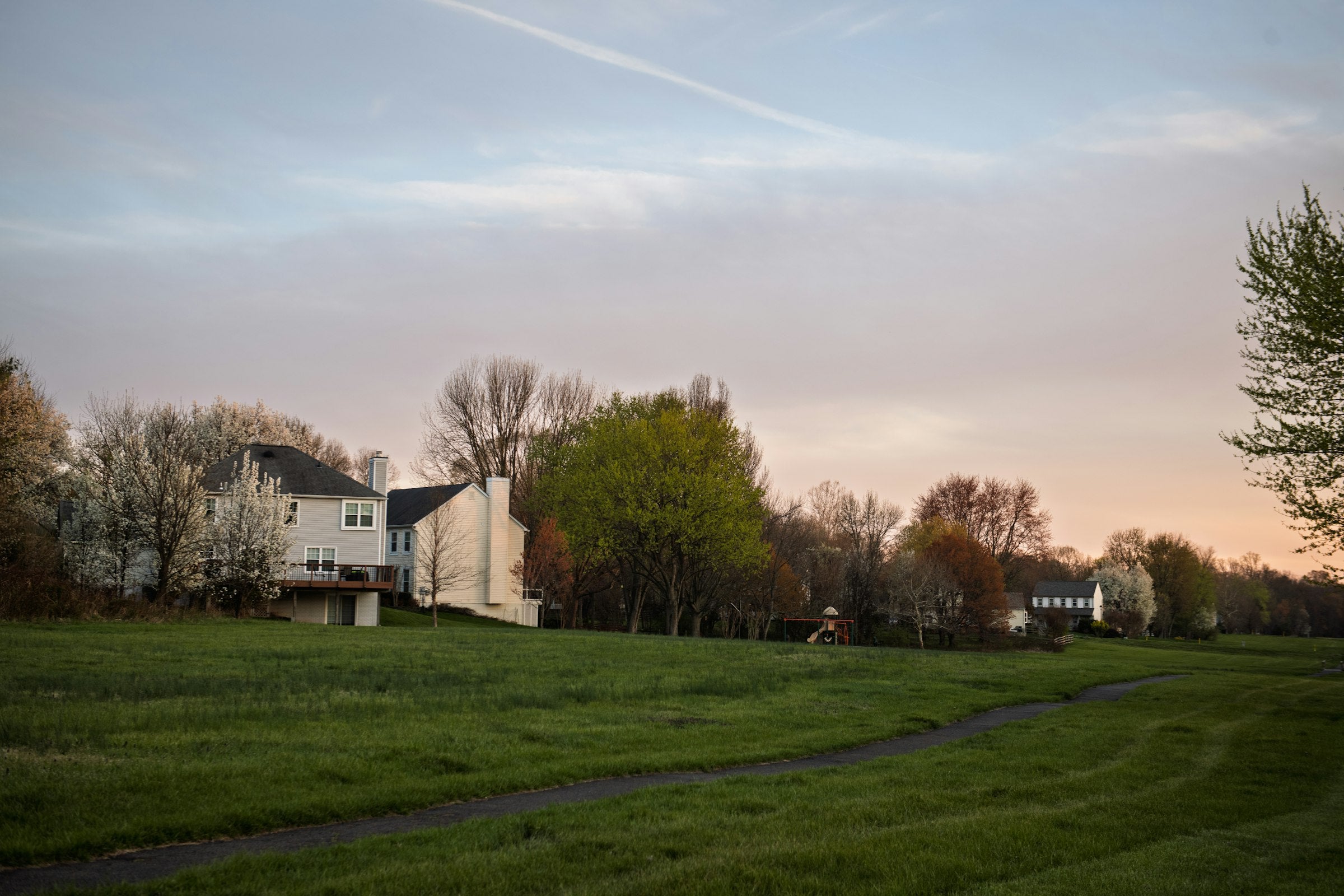 A quiet suburban neighborhood at dusk - know what is happening on your street